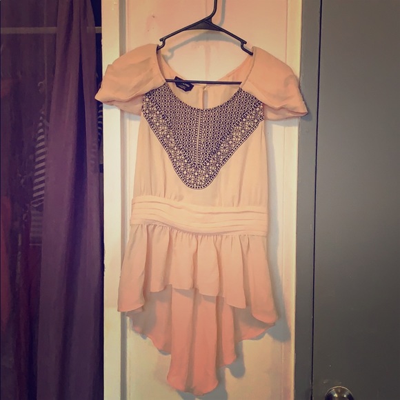 bebe Tops - Bebe peplum sinch waist high-low baby pink top.